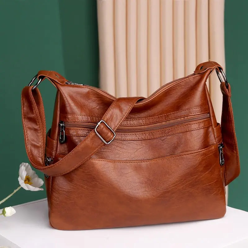 💟👜Geantă de umăr din piele moale la modă nouă