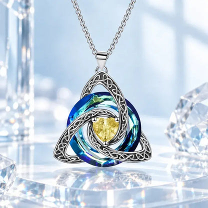 ✨ Lănțișor Elegant cu Pandantiv Nod Celtic și Piatră de Naștere (12 Culori Disponibile)! Design Deosebit în Formă de Inimă · Finisaj Electroplatit Premium · Cadoul Perfect!