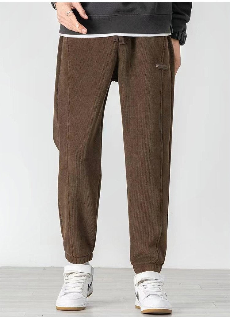 👖【M-5XL】Męskie zimowe spodnie typu casual z prostą, zwężaną nogawką i podszewką z polaru