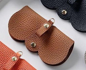🔥【Compra 2, llévate 1 gratis】Bolsa de gafas de sol de cuero suave