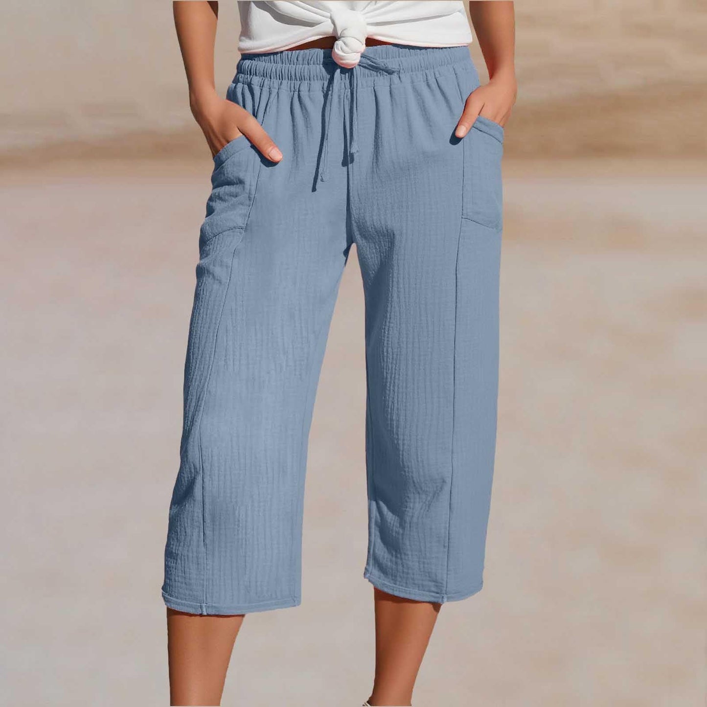 Pantaloni trei sferturi plisați pentru damă – din bumbac și in, culoare solidă