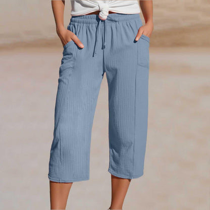 Pantaloni trei sferturi plisați pentru damă – din bumbac și in, culoare solidă