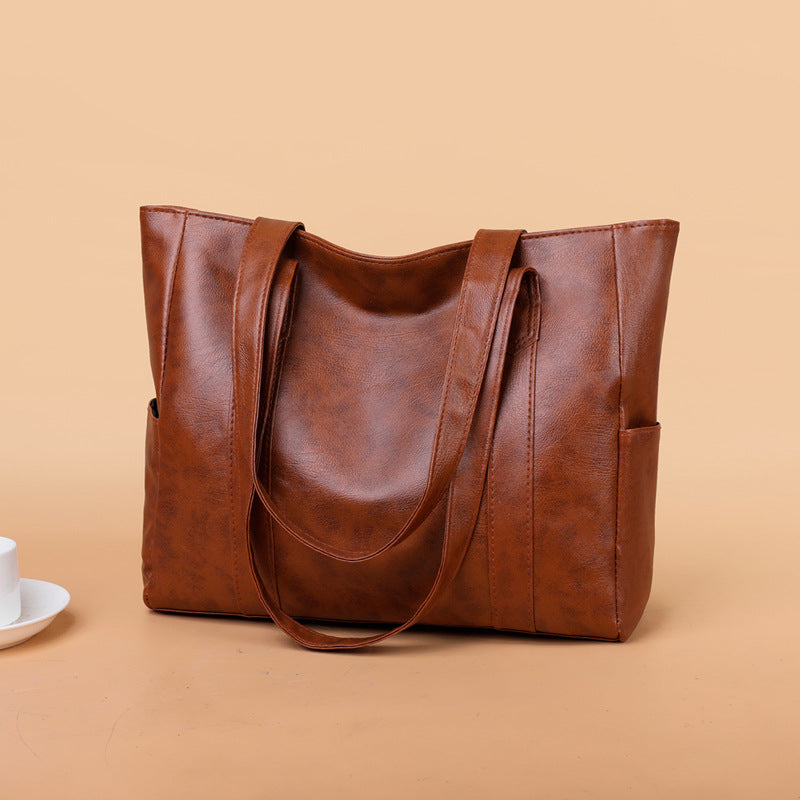 ✨👜【Gorąca wyprzedaż🔥】【Duża pojemność】Damska torba na ramię wykonana z miękkiej skóry, nowość w 2025 roku.