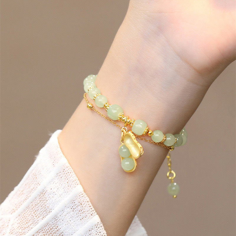 🔥【50% de descuento】Una pulsera de jade Hetian de doble capa, que simboliza la buena fortuna y la prosperidad.