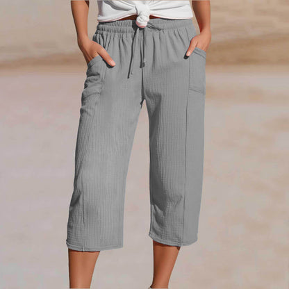 Pantaloni trei sferturi plisați pentru damă – din bumbac și in, culoare solidă