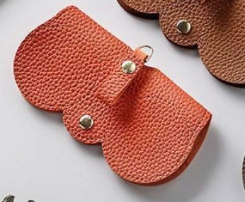 🔥【Compra 2, llévate 1 gratis】Bolsa de gafas de sol de cuero suave