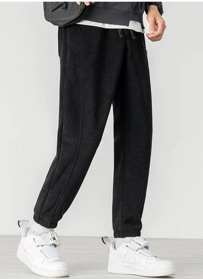 👖【M-5XL】Męskie zimowe spodnie typu casual z prostą, zwężaną nogawką i podszewką z polaru